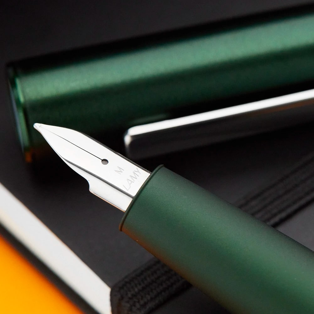 Lamy Aion Fountain Pen Darkgreen — writing at an angle