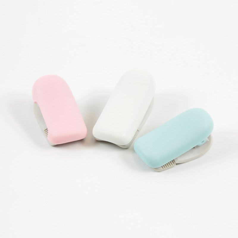 Kokuyo Karu Cut Tape Cutter Clip-Type (20-25mm) Pink — applied on surface