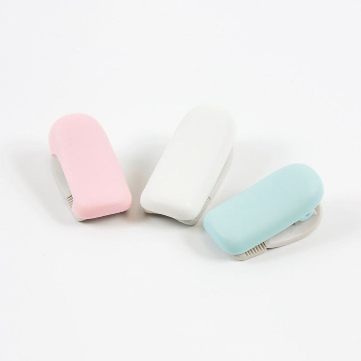 Kokuyo Karu Cut Tape Cutter Clip-Type (20-25mm) Pink — applied on surface